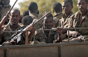 Ethiopian troops ride on a military truck in Somali's capital Mogadishu